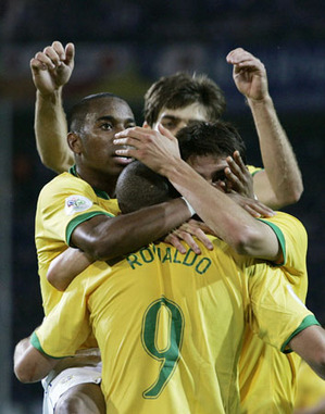 Brazil's Ronaldo celebrates with team mates after scoring against Japan during Group F World Cup 2006 soccer match in Dortmund